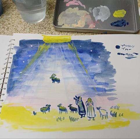 水彩画とパレット、水の入ったコップ