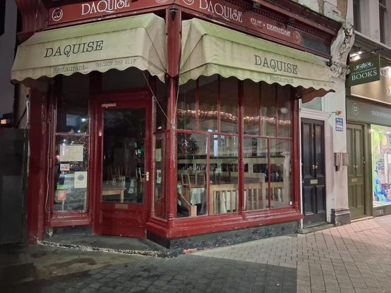 A picture of the front of a restaurant, called "Daquise".