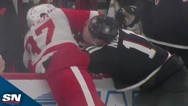 Red Wings' JT Compher Fights Devils' Stefan Noesen After Laying Big Hit On Nico Hischier