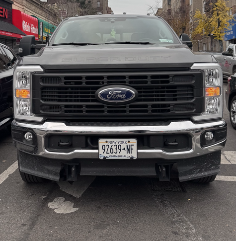 A ford SUV with a very stubby grill that makes a huge blind spot right in front of the car.