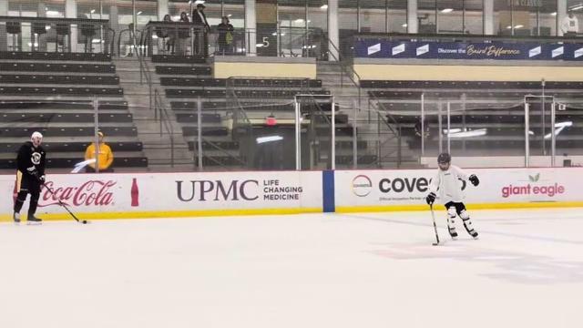 Evgeni Malkin skates with son Nikita after Penguins practice