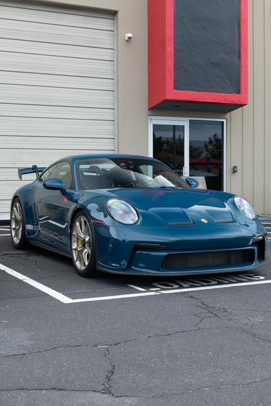 Dark teal sports coupe