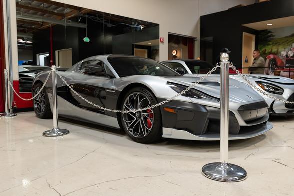 A silver and black exotic coupe