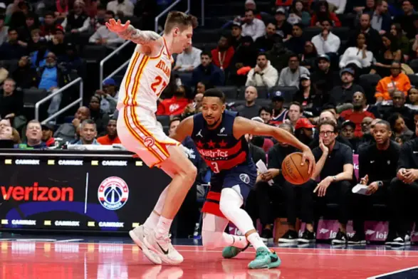 Wizards snap 14-game losing streak as Magic set scoring record