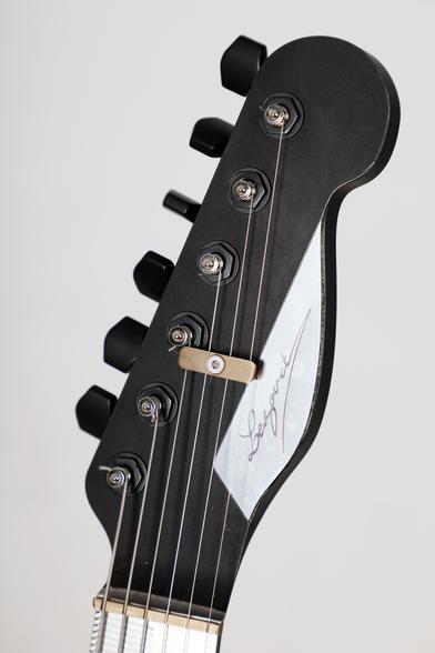 Legouet guitar Camo Blue model. Headstock view.