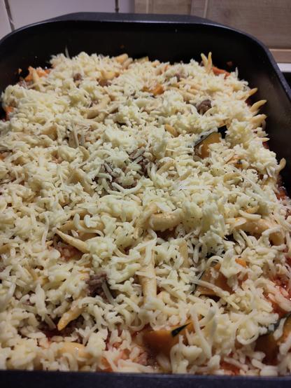 ..und anschließend mit Käse bestreut zum Überbacken.