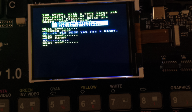 Photo of a ESP32 Rainbow showing a screenshot of Crisis of Christmas