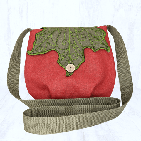 Photo du même sac mais dans un autre coloris. Cette fois ci, il ressemble à une citrouille car le corps du sac est en lin orange.