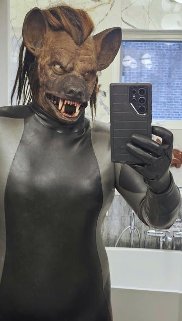 Bathroom mirror selfie in full smoothskin wetsuit + hyena mask