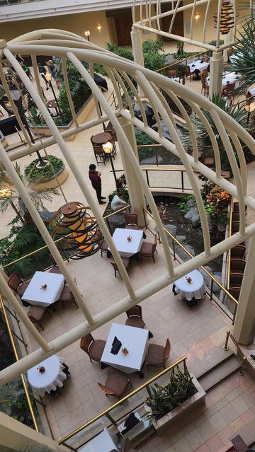 View of the dining area in a late 80s atrium hotel.