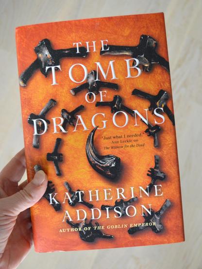 cover for the fantasy novel The Tomb of Dragons by Katherine Addison