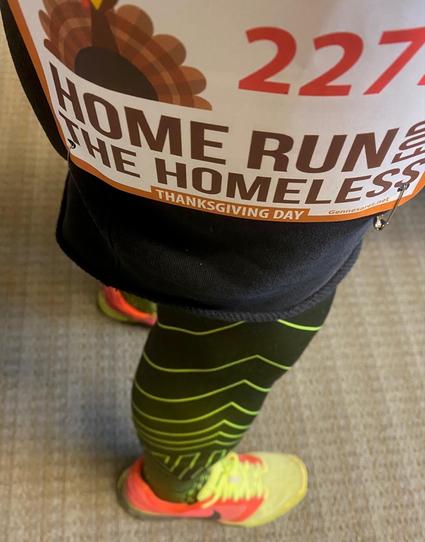 Color image of a runner's bib for the 38th Annual Home Run for the Homeless Four Mile Run  in Akron, Summit County, Ohio, USA.