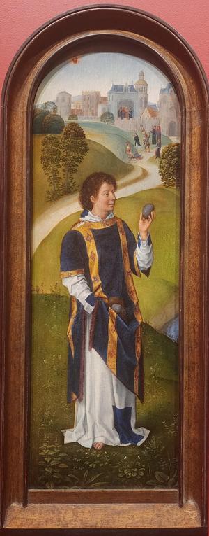 Tall, arched painting of St stephen in deacon's robe holding a stone in his left hand and holding other stones in his robe. In the background is the scene of his execution outside the city gates, with people throwing rocks at a kneeling figure.