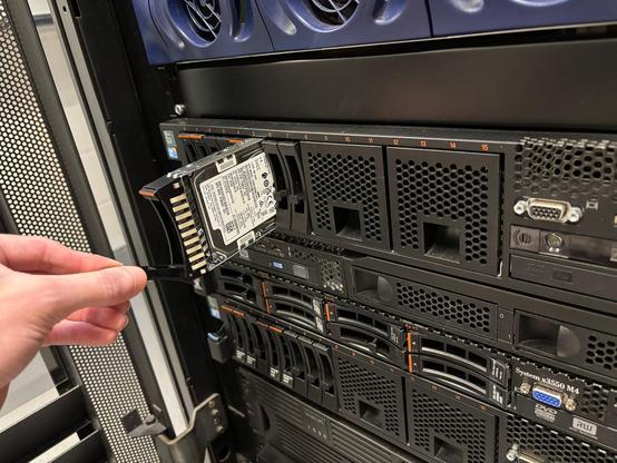 1.2TB disk drive being inserted to an IBM x3650