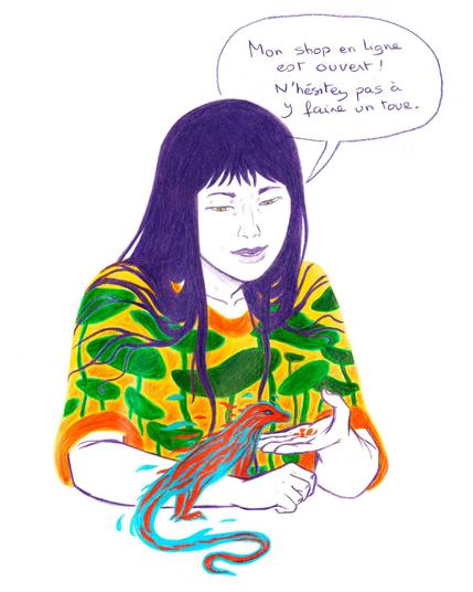 This is a colored pencil drawing, a portrait of a woman with purple hair wearing a top with colorful plant patterns. She reaches out toward a small imaginary lizard with vivid colors, placed in front of her and seemingly searching for the seeds she holds in her hand. A handwritten speech bubble reads: “My online shop is open! Feel free to check it out.”