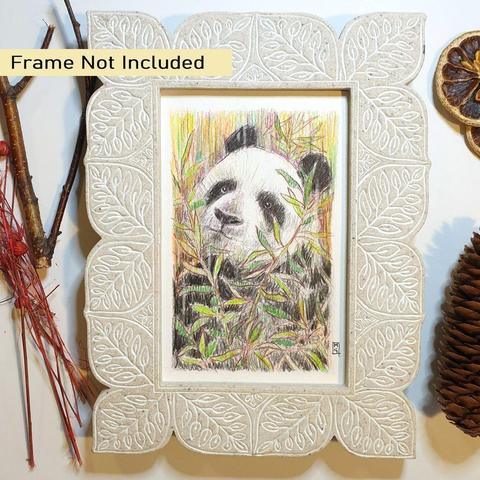 A very small drawing of a giant panda with bamboo. This drawing is in colour pencil and has a loose painterly feel.
An original art work, please note that the frame is not included.
Colour pencil on white acid free artist watercolour paper (postcard size).
Approximately 4 by 6 inches (10.16 x 15.24 cm) will fit into a standard 4 by 6 inch photo frame.