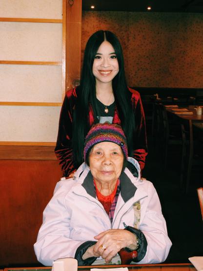 Photo of Chicago artist Jenny Lam with her late maternal grandmother at Jenny's August 2019 birthday party at Kamehachi in Northbrook, Illinois.