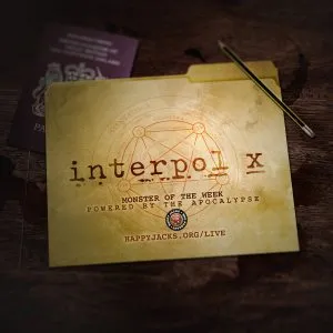 An ad card for the Interpol X AP from the Happy Jacks RPG Network. It features the title overlaid on a manilla folder.
