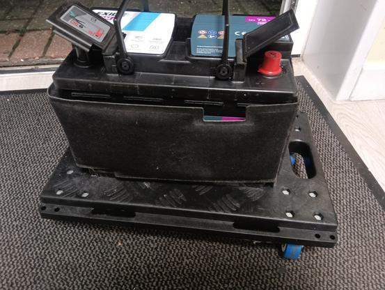 New battery on a small trolley (its heavy, and this should also stop the bottom getting scuffed compared to setting it down on the concrete/bricks in the yard)