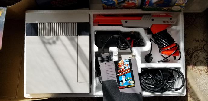 NES with light gun and duck hunt, in original box