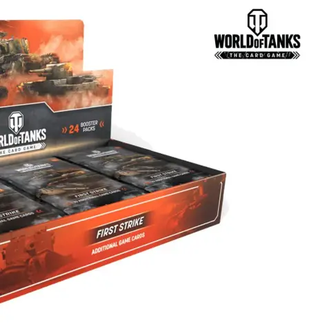 A display box for the "World of Tanks: The Card Game" features 24 booster packs, prominently labeled "FIRST STRIKE" for additional game cards. The box has a striking design with a dark background and vibrant orange accents, showcasing images of tanks and battle scenes. The "WORLD of TANKS" logo is displayed at the top, emphasizing the game's connection to the popular video game.