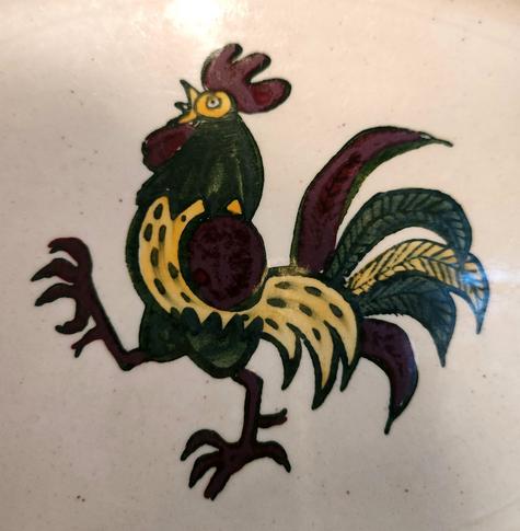 Rooster from the center of a poppycock platter