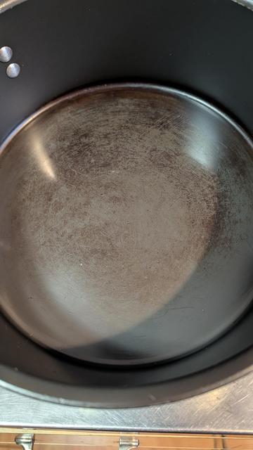 The stained interior of a well used Calphalon pot