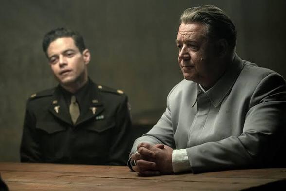 Russell Crowe and Rami Malek in a scene from the film Nuremberg
