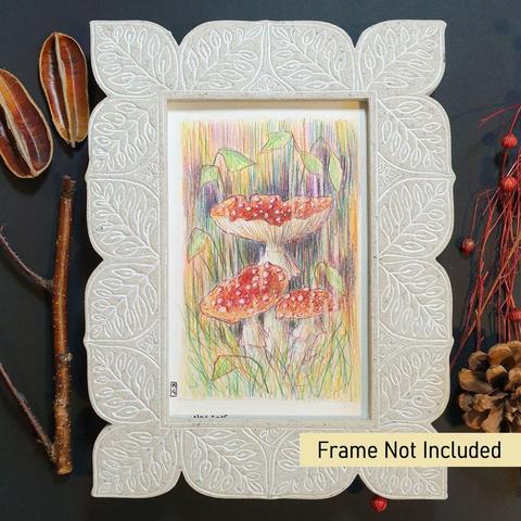 A very small drawing of fly agaric mushrooms in colour pencil. The drawing is in a very loose, soft focus, painterly style.
An original art work, please note that the frame is not included.
Colour pencil on white acid free artist watercolour paper (postcard size).
Approximately 4 by 6 inches (10.16 x 15.24 cm) will fit into a standard 4 by 6 inch photo frame.