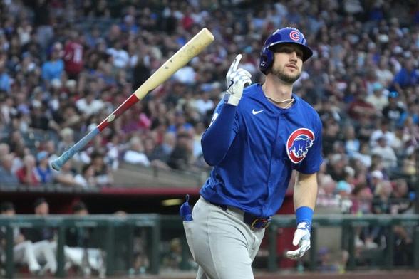 Chicago Cubs outfielder Kyle Tucker (30) hits a two-run home run against the Arizona Diamondbacks in the fifth inning at Chase Field.
