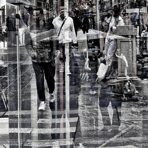 Barcelona digital edited double exposure street photography, made with the GNU Image Manipulation Program.