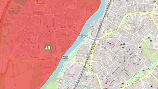 Karte der Stadt Gießen, geteilt durch den Fluss Lahn. Im Westen alles rot und mittendrin ein grüner Punkt in dem AfD steht.