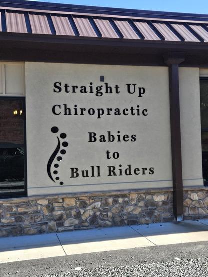 Sign that says Straight Up Chiropractic. Babies to bull riders.