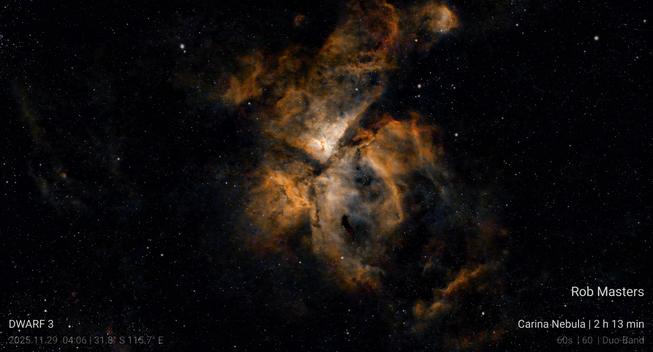 A bright orange/yellow nebula, with a "Y" of dust lanes. Text in the corners gives the date, location, and exposure details (see text).