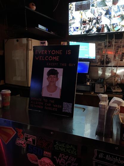 Picture at a bar of a poster of a guy who called ICE to get some workers detained at a local car wash.  It states that everyone but him is welcome at the establishment.