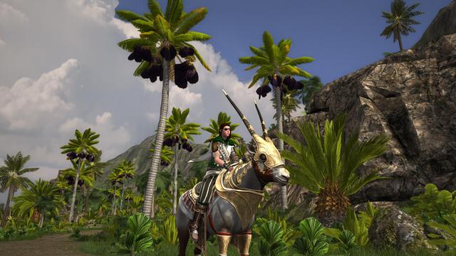 Riding a large Oryx. It's a kind of goat with long, straight pointed horns. This one also has a gold-coloured mask and other areas too as armour.
The backdrop is a semi-cloudy sky, grey rocks and palm trees.