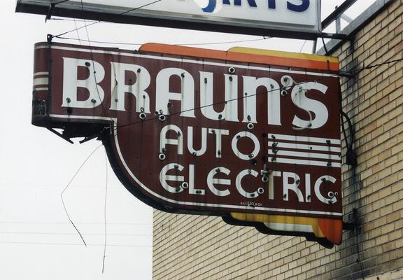 An old neon sign for Braun's Auto Electric.