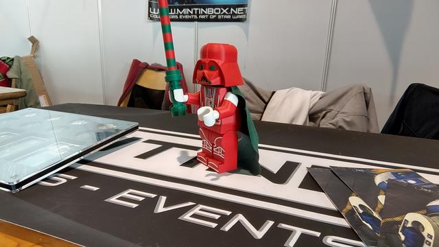 3D print of a XMas figure of Darth Vader on a MintInBox banner.