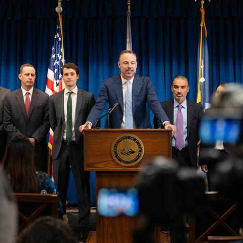 Joseph H. Thompson, center, the federal prosecutor overseeing the cases, at the U.S. District Courthouse in Minneapolis in September.