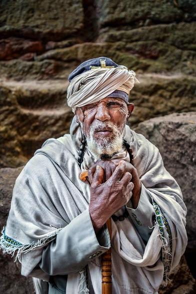 Portrait of an Orthodox priest in one of the eleven rock-hewn monolithic churches in Lalibela (Ethiopia).

This image is one of over 200 large-format photos featured in the HUMANKIND limited-edition book: <a href="https://robertopazziphoto.com/#book" rel="noreferrer nofollow">robertopazziphoto.com/#book</a>

Lalibela is a town in the Amhara Region of Ethiopia, known for its rock-hewn churches, which were carved out of solid rock in the 12th century under the direction of King Lalibela.
The churches are a UNESCO World Heritage Site renowned for their architectural and historical significance.
There are 11 medieval monolithic churches in Lalibela, each with its own unique architectural style and design. These churches are divided into two main groups, known as the Northern and Southern clusters.

Website: <a href="https://robertopazziphoto.com/" rel="noreferrer nofollow">robertopazziphoto.com/</a>

Instagram: <a href="https://instagram.com/Roberto_Pazzi_Photography" rel="noreferrer nofollow">instagram.com/Roberto_Pazzi_Photography</a>