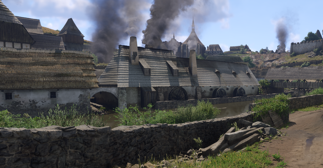 Screenshot von KDC2. Ein weiß getünchtes Haus an einem Gewässer. An der Breitseite sind mehrere hölzerne Wasserräder installiert.