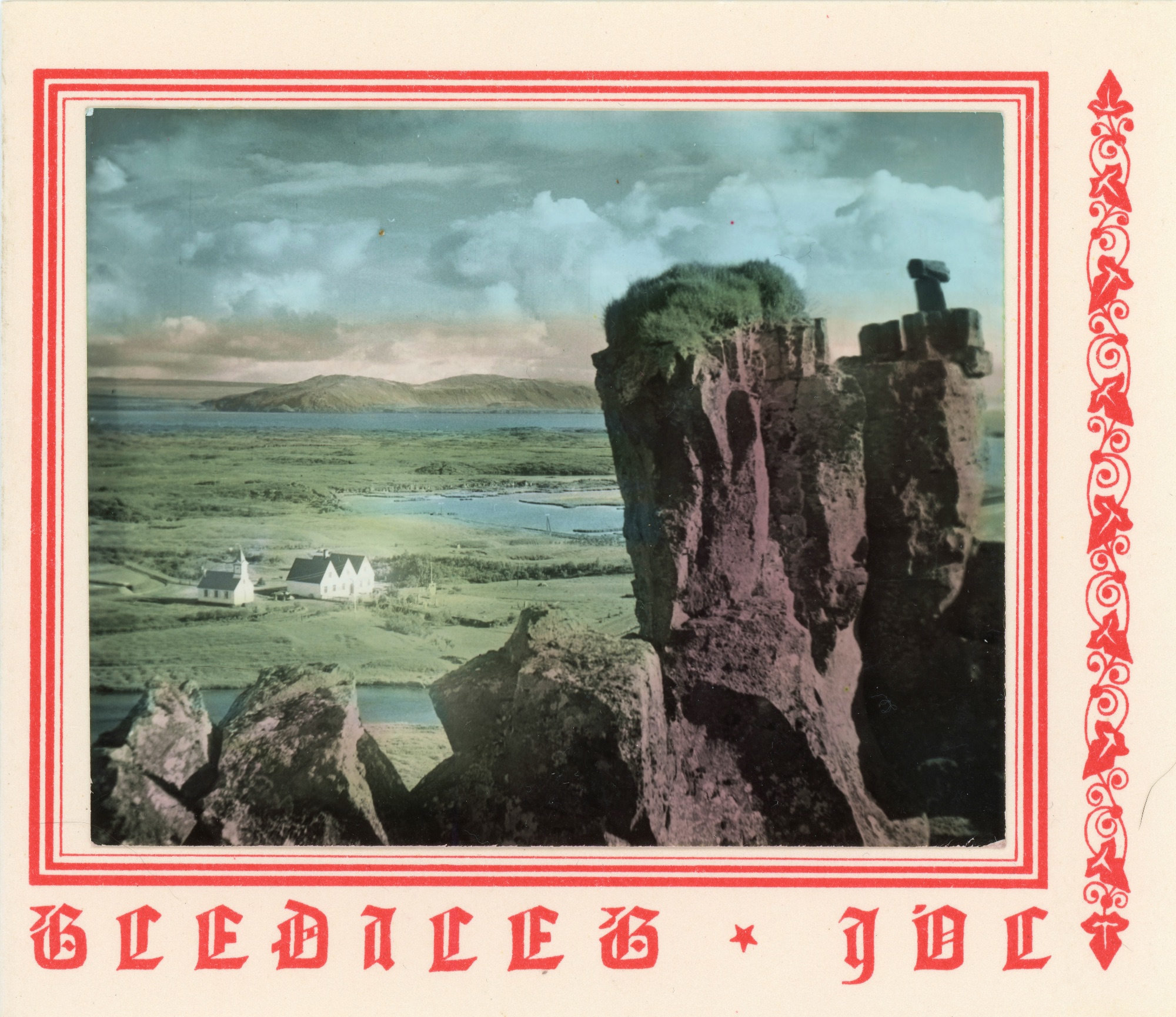 An old Icelandic Christmas card featuring a hand coloured photograph of Thingvellir.