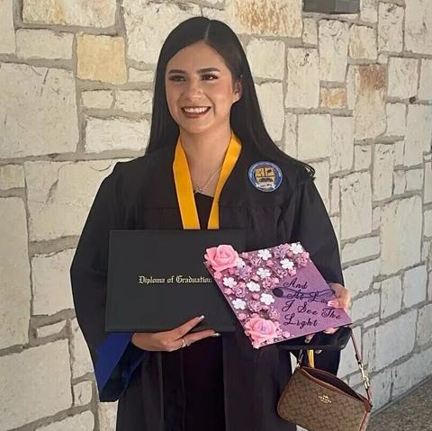 Any Lucia Lopez Belloza celebrating her high school graduation in Texas.