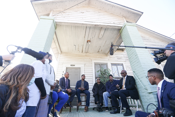 In 2021, Dr. Robert Bullard, from right, talks with Fifth Ward residents Water Mallett, Doris Brown, then-EPA Administrator Michael S. Regan and Houston Mayor Sylvester Turner during Regan's tour of Houston to highlight environmental justice concerns. Credit: Elizabeth Conley/Houston Chronicle