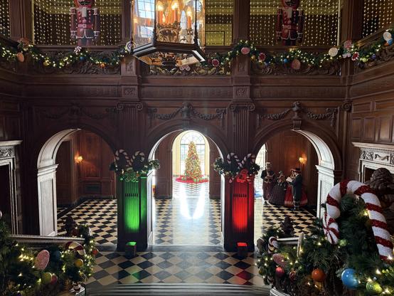 Holiday decorations beyond the arches.  View from top of stairs