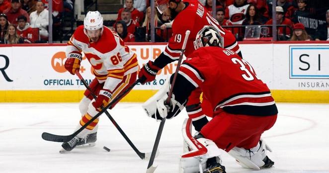 Bussi makes 15 saves for 1st NHL shutout, Ehlers scores in OT in Hurricanes' 1-0 win over Flames | National Sports