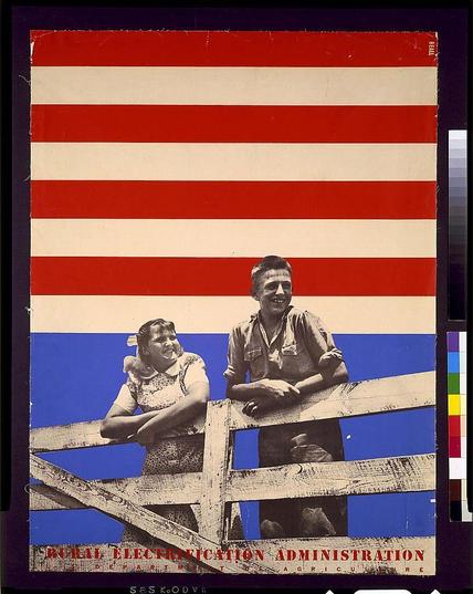 The image depicts a poster featuring two individuals leaning on a wooden fence against a backdrop with horizontal stripes in red, white, and blue. The person on the left appears to be a young girl wearing a patterned top and has her arms crossed; she is smiling broadly towards the camera. To the right stands an older man or boy dressed in casual work attire including overalls and rolled-up sleeves, also grinning at the viewer with his hands resting on the fence. Above them is text that reads "RURAL ELECTRICITY ADMINISTRATION" followed by smaller text which seems to be a departmental name associated with agriculture. The poster has visible signs of wear or damage around its edges indicating it may have been used for some time before being displayed as part of an exhibition or collection, such as those found in libraries and museums dedicated to the history of rural electrification efforts within the United States during the early 20th century.
The overall composition uses a striking color contrast with vibrant reds, whites, blues against neutral tones on clothing. The poster's design elements evoke themes associated with American patriotism and progress under government administration initiatives aimed at improving access to electricity for remote or rural areas in America.