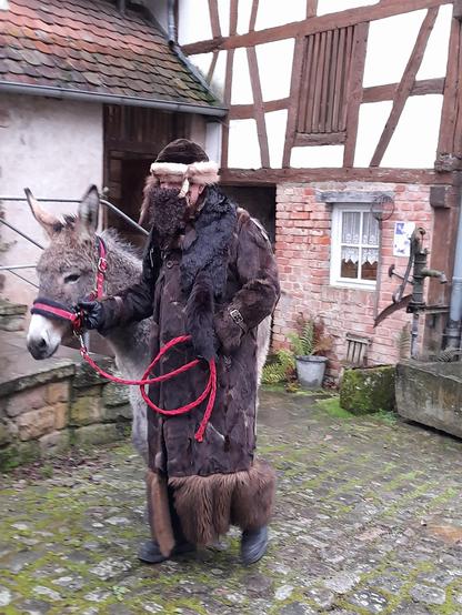 Same persons, same place.