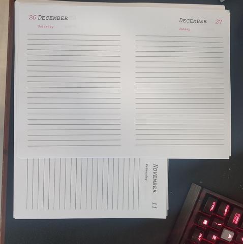 Pictures of planners booklets ready to be bound