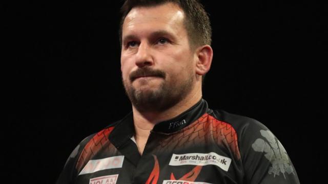 Jonny Clayton competing at the 2022 Cazoo Premier League Darts play‑off in Berlin, Germany.